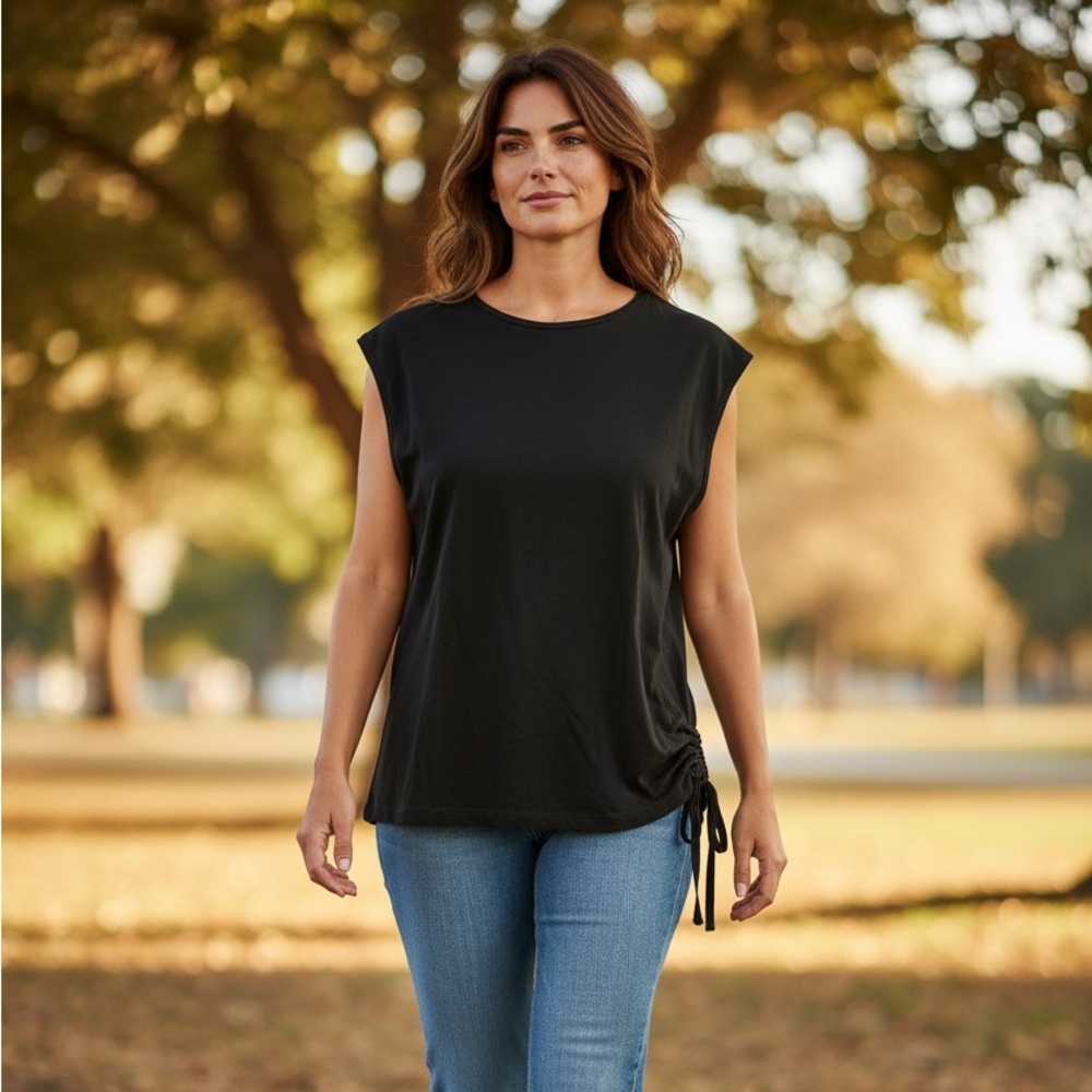 Bryn Walker black sleeveless top with side ruching/tie. Great layering piece.‎